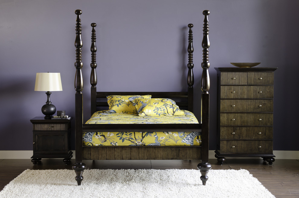 eclectic bedroom with purple walls