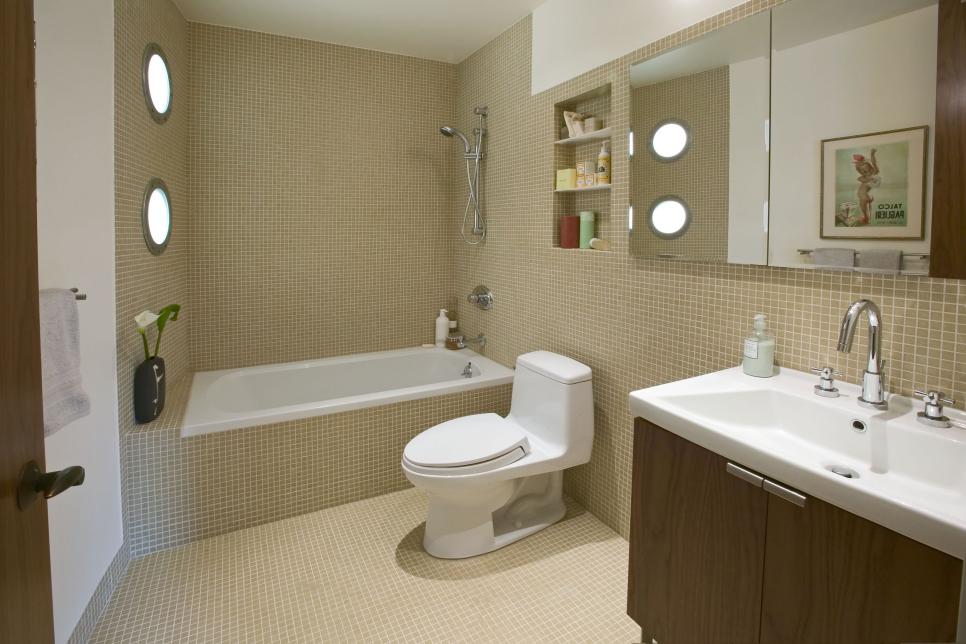 contemporary bathroom boasts tan tile