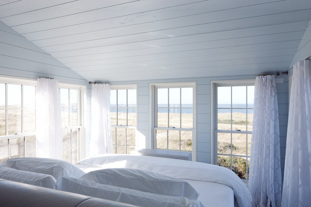 peaceful white beach style master bedroom