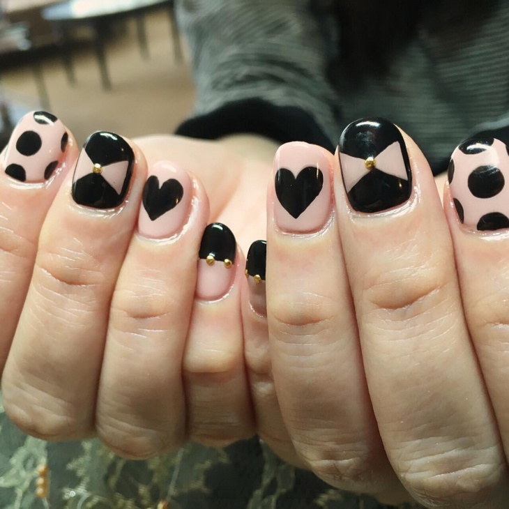 black and pink gel nail art