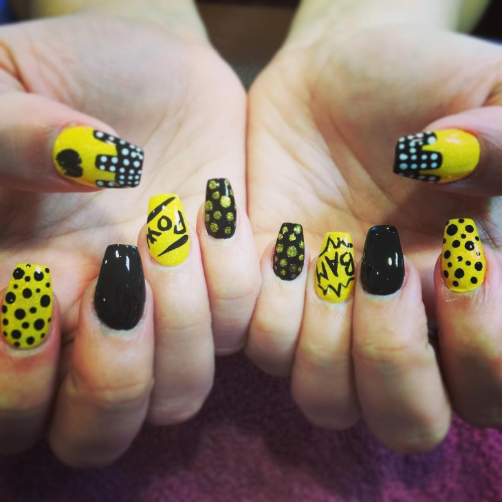yellow and black batman nail art