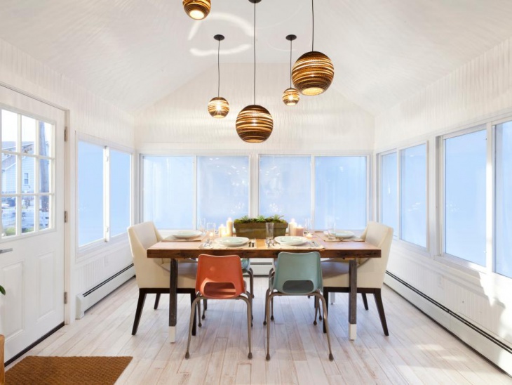 dining room with globe pendant lights