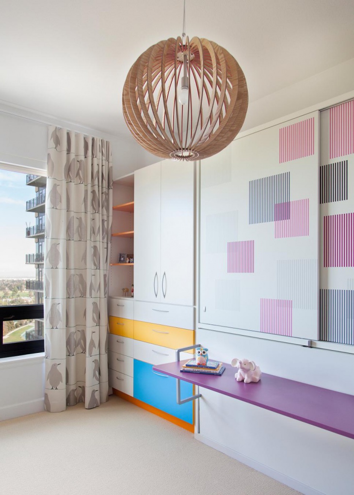 modern kids room with geometric chandelier