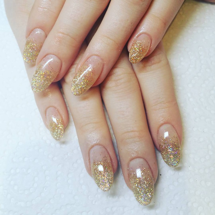 gold glitter nail design