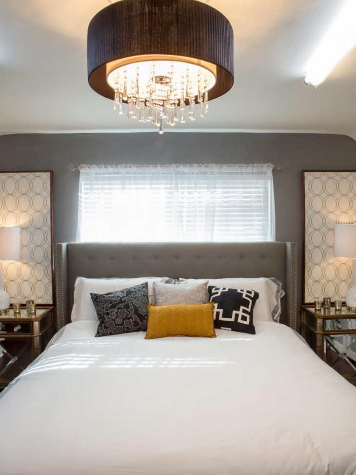 midcentury modern bedroom with large circular drum ceiling light