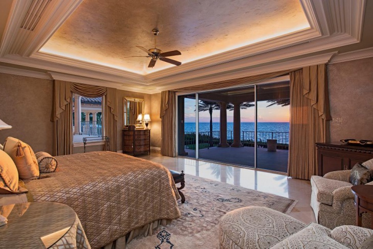 royal bedroom with a lighted tray ceiling