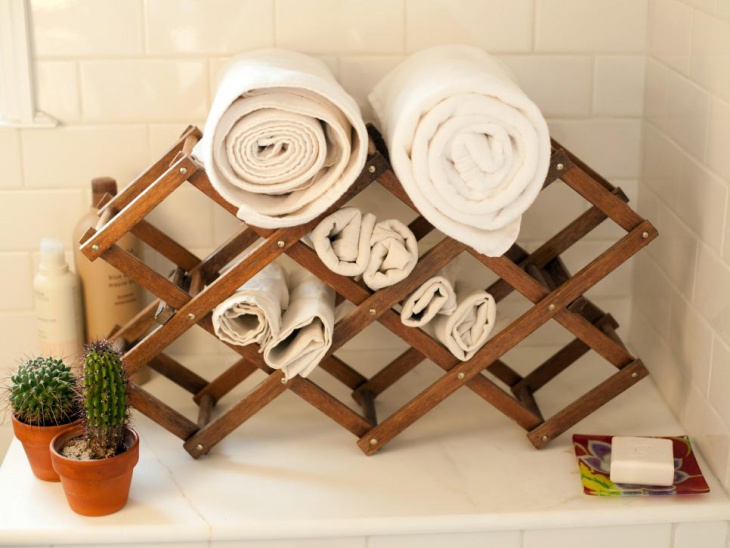 wine rack towel holder with white towels