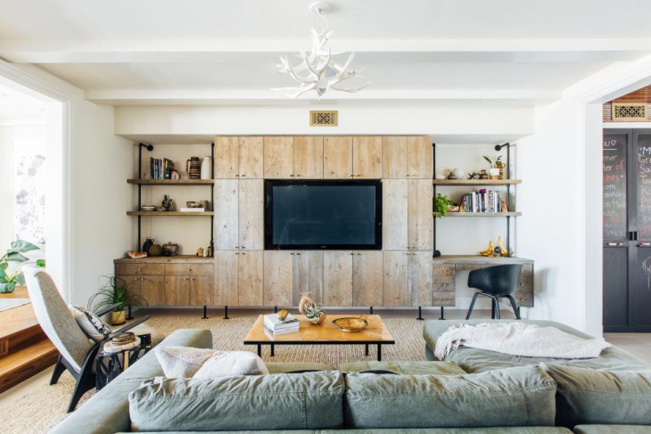 living room with industrial reclaimed wood cabinets