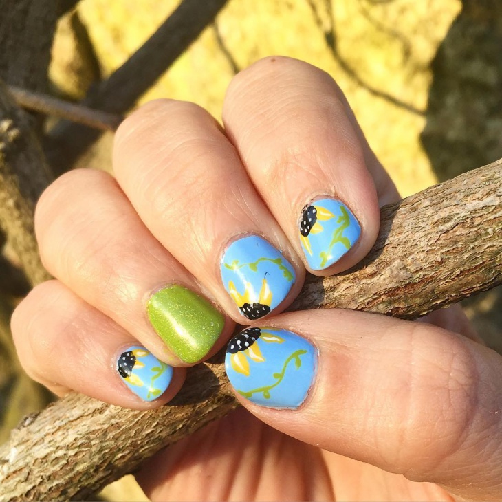 blue floral designed nails