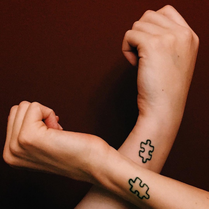 cool puzzle tattoo for siblings