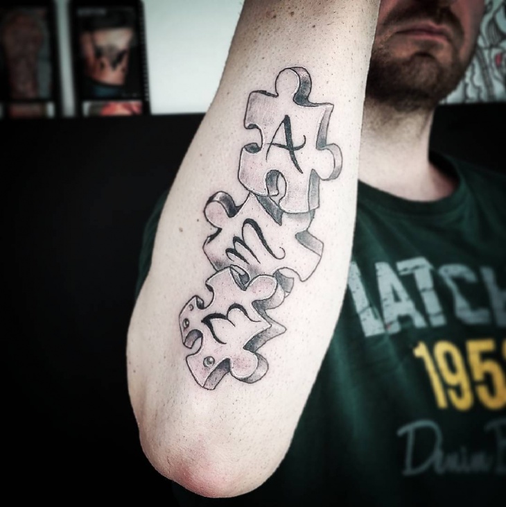 amazing puzzle tattoo for hand