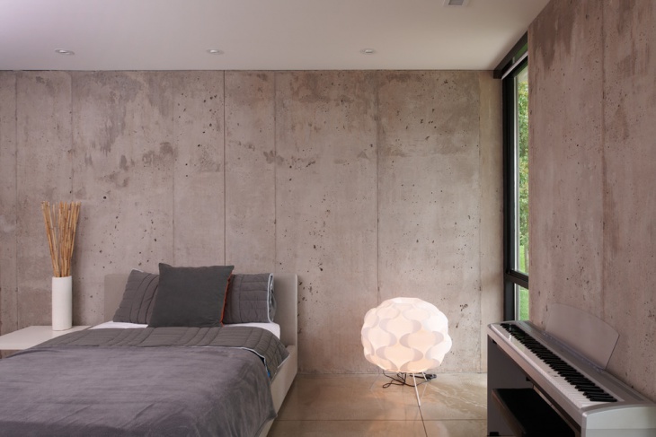 chic bedroom with concrete wall