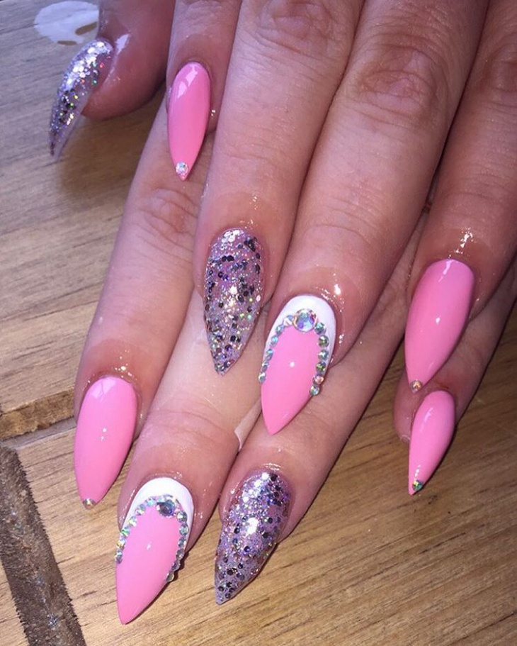 pink glitter nail art on dark skin