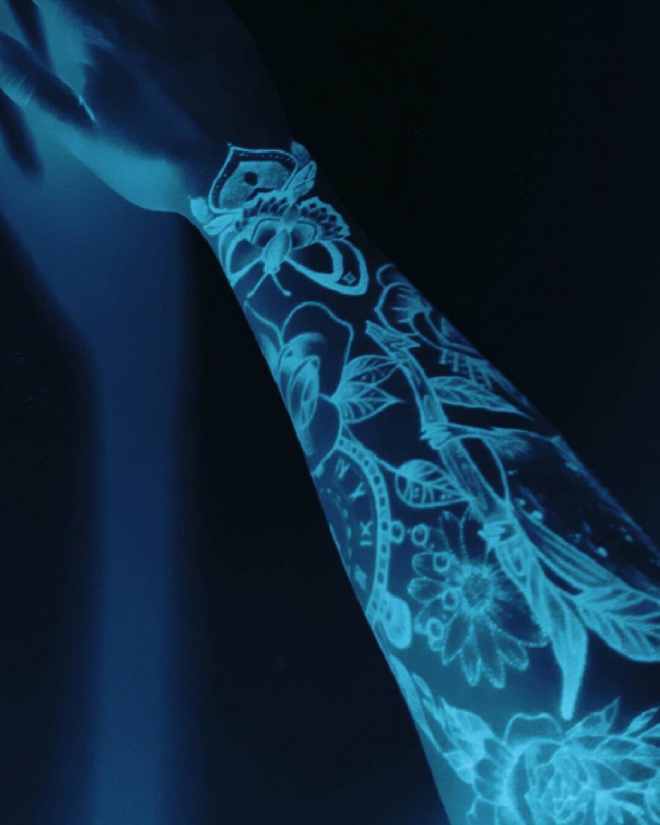amazing glow in the dark hand tattoo