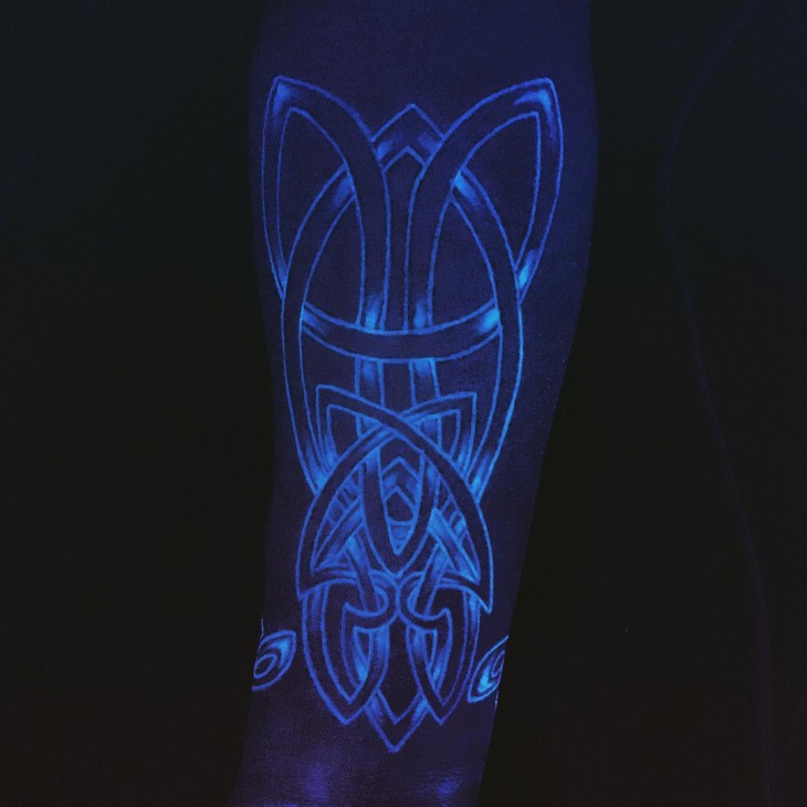 oscar black light tattoo