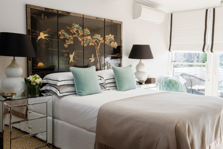 classy bedroom with designed headboard