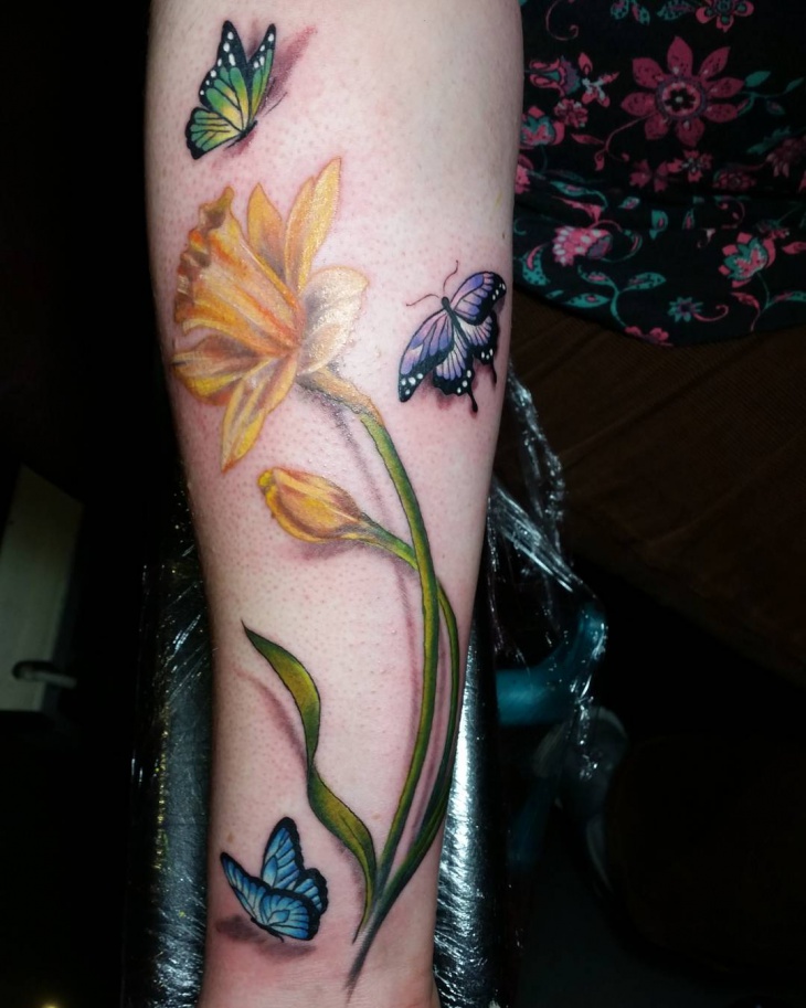 daffodil and butterfly tattoo