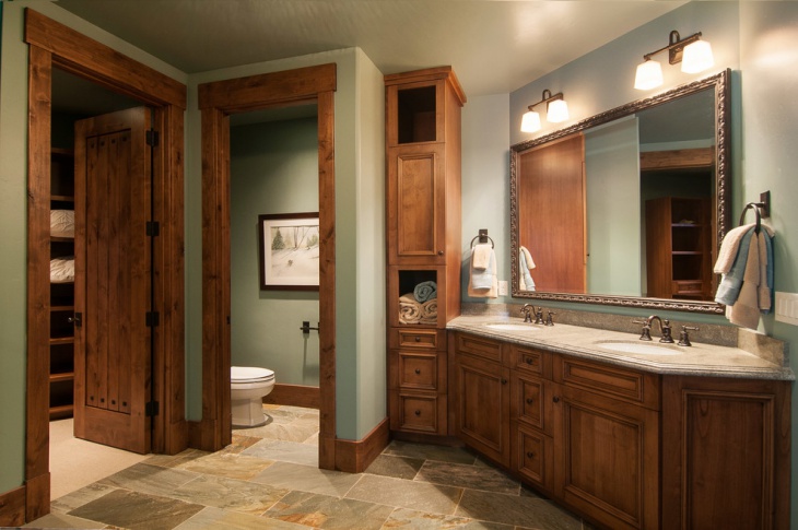 rustic bathroom with wooden cabinets