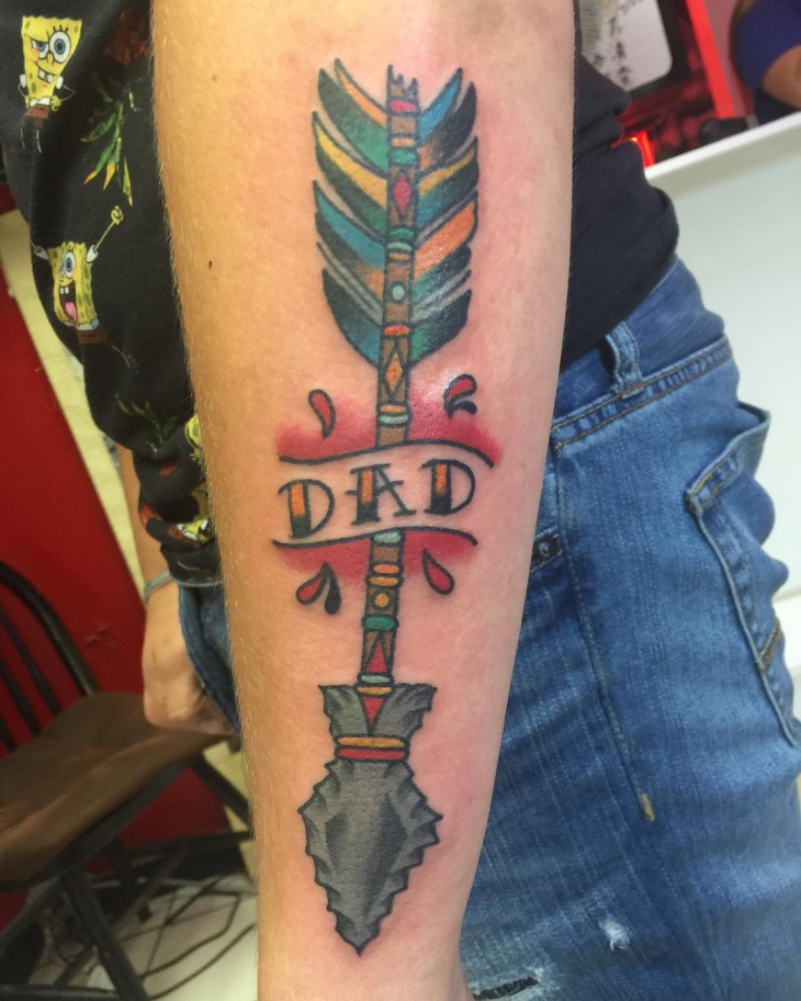 arrow tattoo on forearm