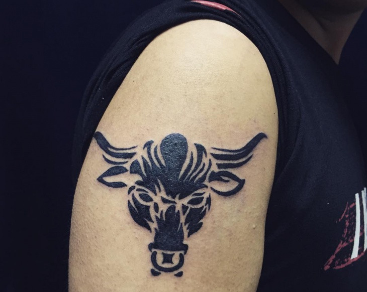 black inked bull tattoo idea