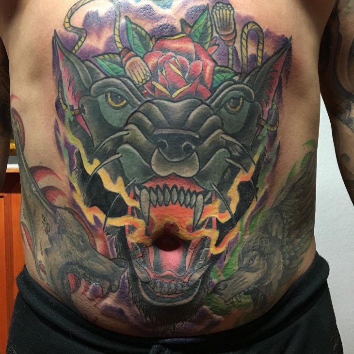 colorful wolf tattoo on stomach