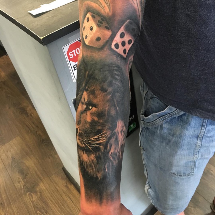 realistic lion tattoo on hand