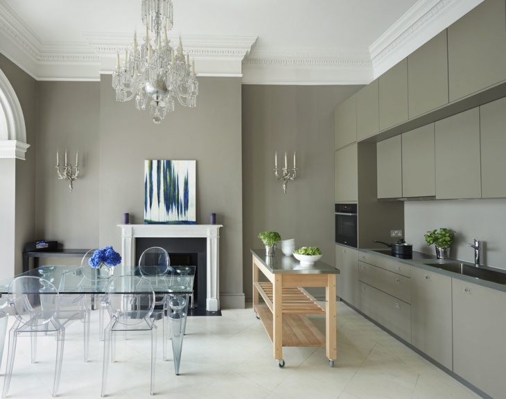 grey and white kitchen with crystal chandelier