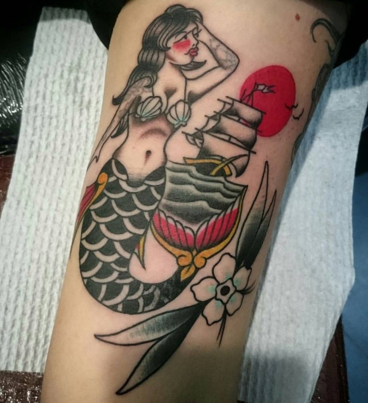 ship with mermaid tattoo