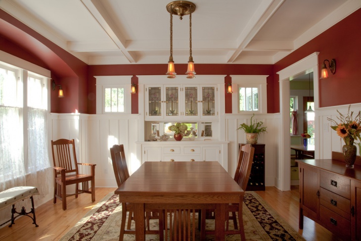 beautiful dining hall with red walls lamps