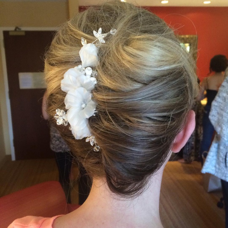 bridal updo with flowers