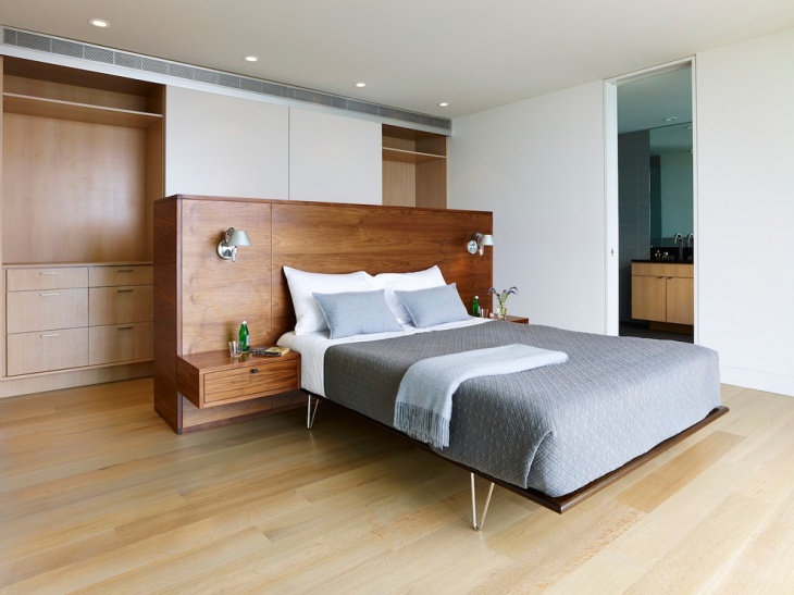 cozy bedroom with wooden storage cases