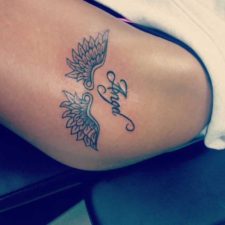 wing tattoo design on arm