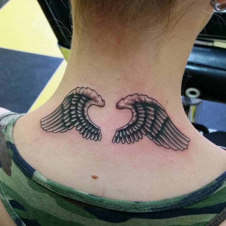 angel wing tattoo on neck