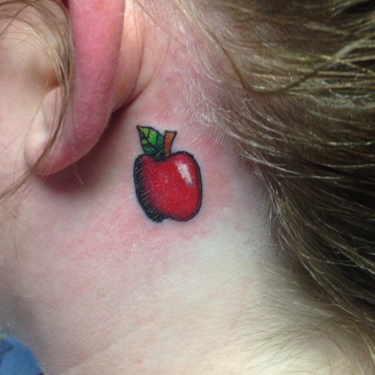 little apple tattoo below ear