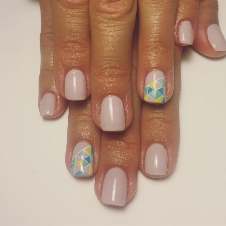 light colored nails with triangle art