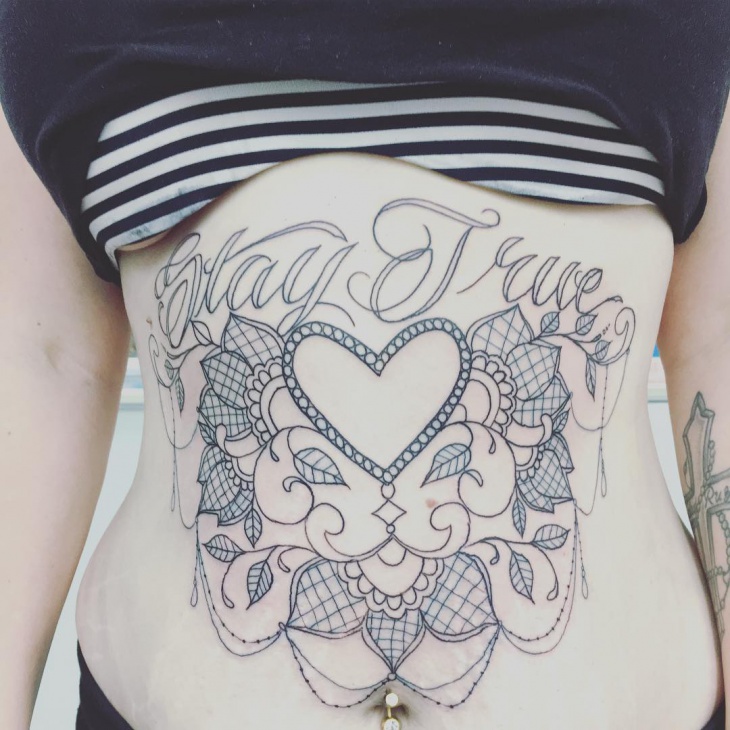 lace work heart tattoo