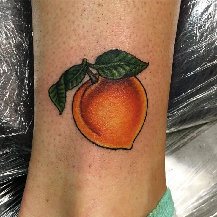 mango fruit tattoo for men