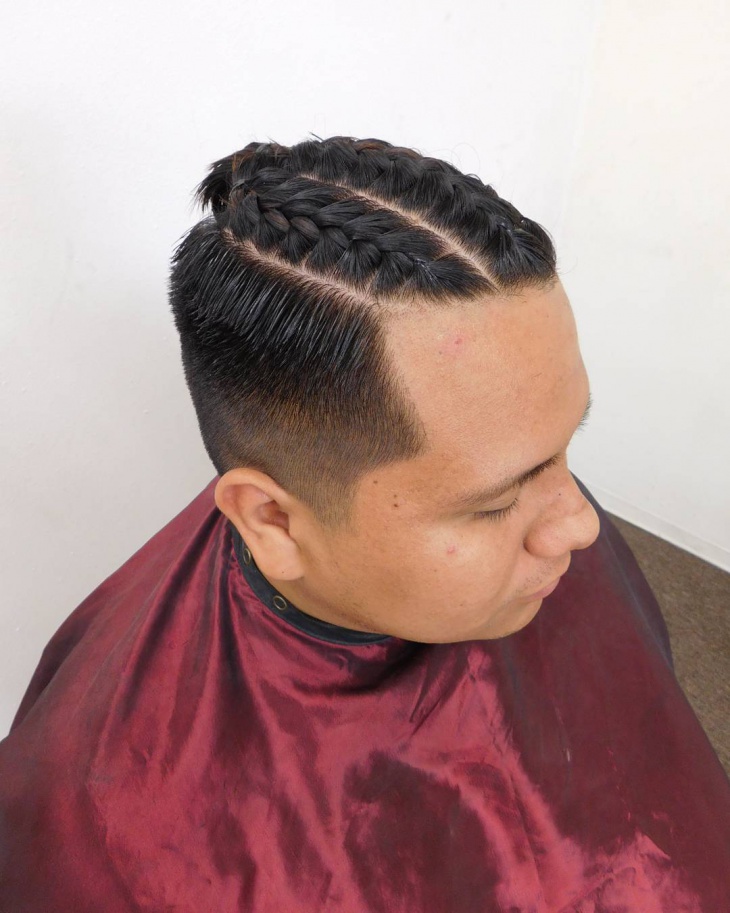 braided bun hairstyle for men