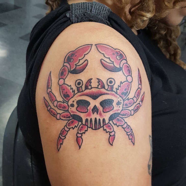 pink crab arm tattoo
