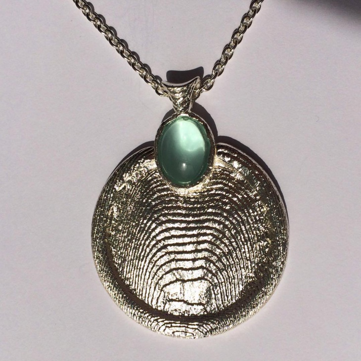 silver round pendant