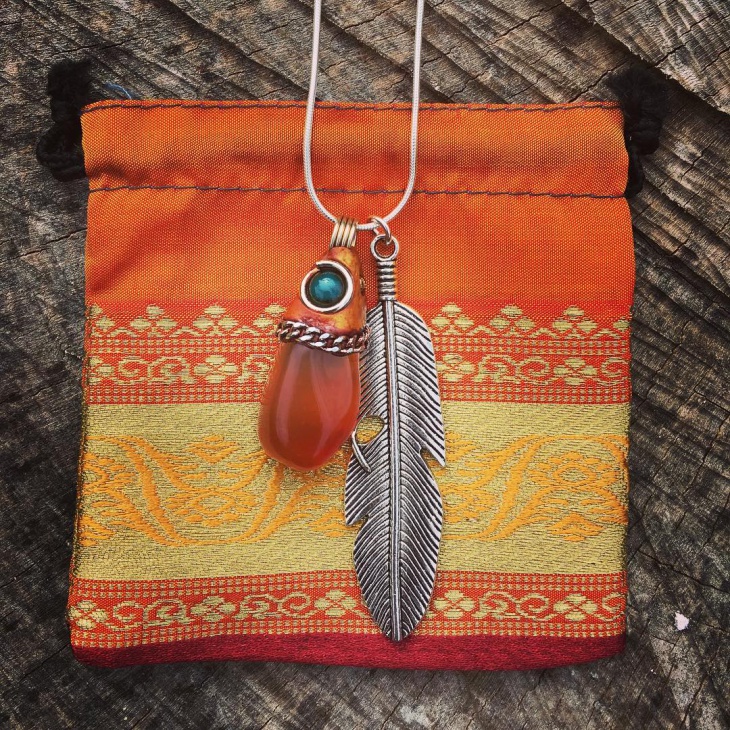 silver feather pendant