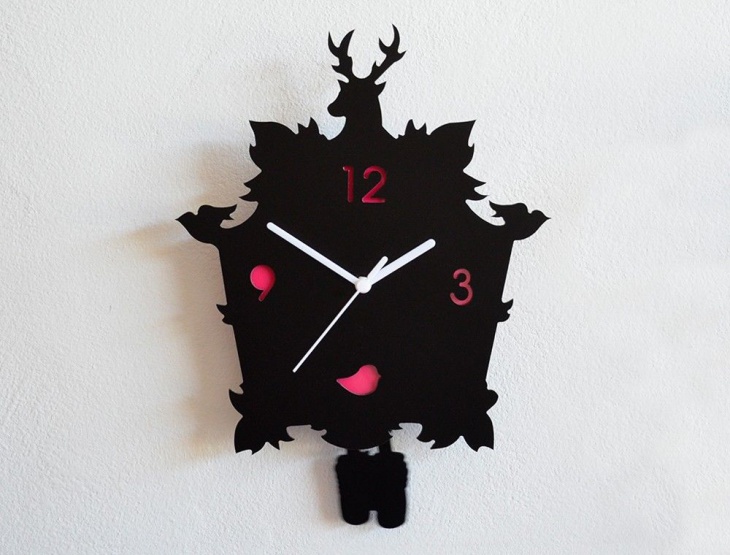 black pendulum wall clock