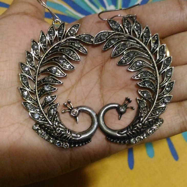 fashionable peacock earrings