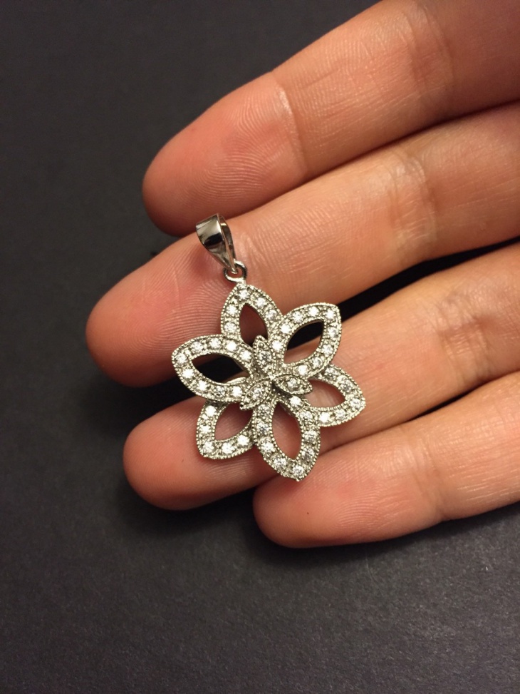 small snowflake diamond pendant