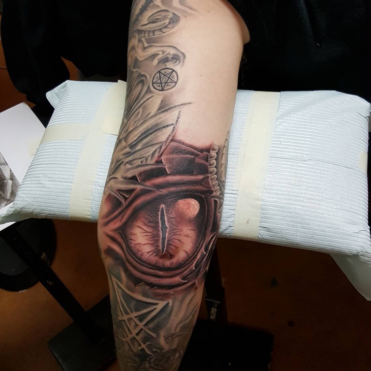 beautiful dragon tattoo on elbow
