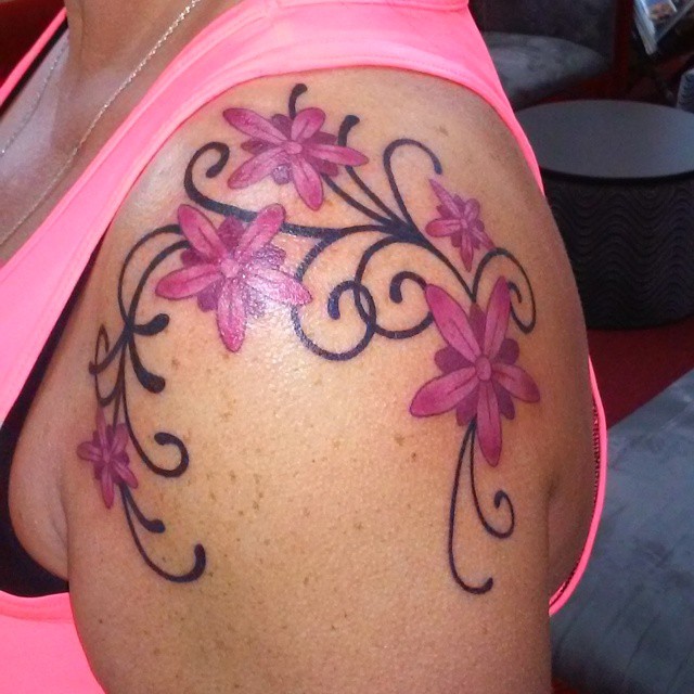 flowers and swirls tattoos 