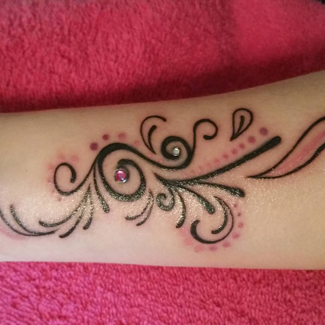 beautiful swirl tattoo idea