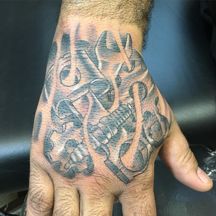 mechanic tattoo on palm