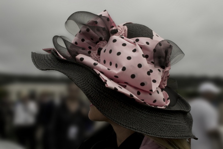 pink and black polka dot hat