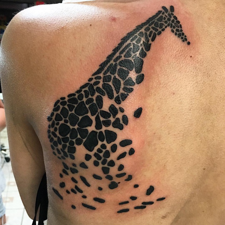 african tribal giraffe tattoo